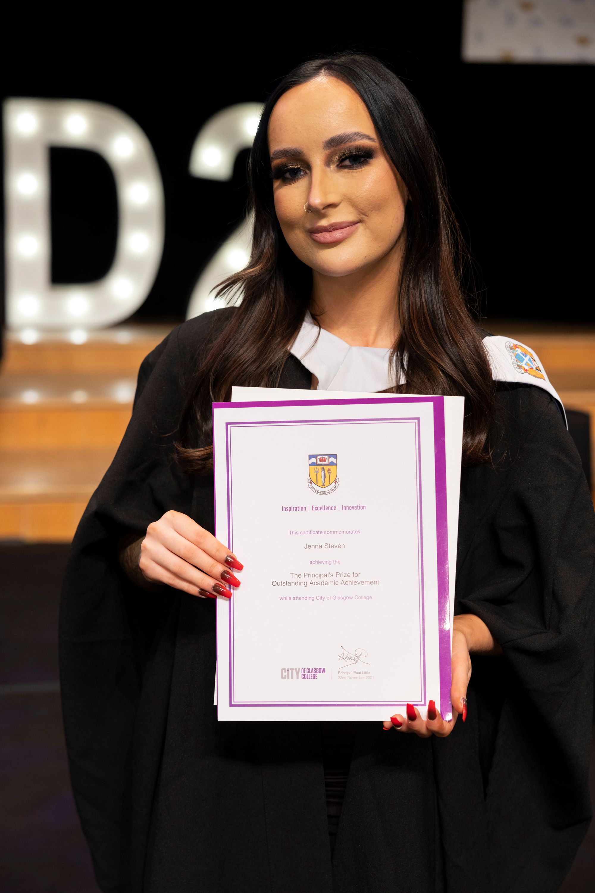 Irvine woman earns top college award