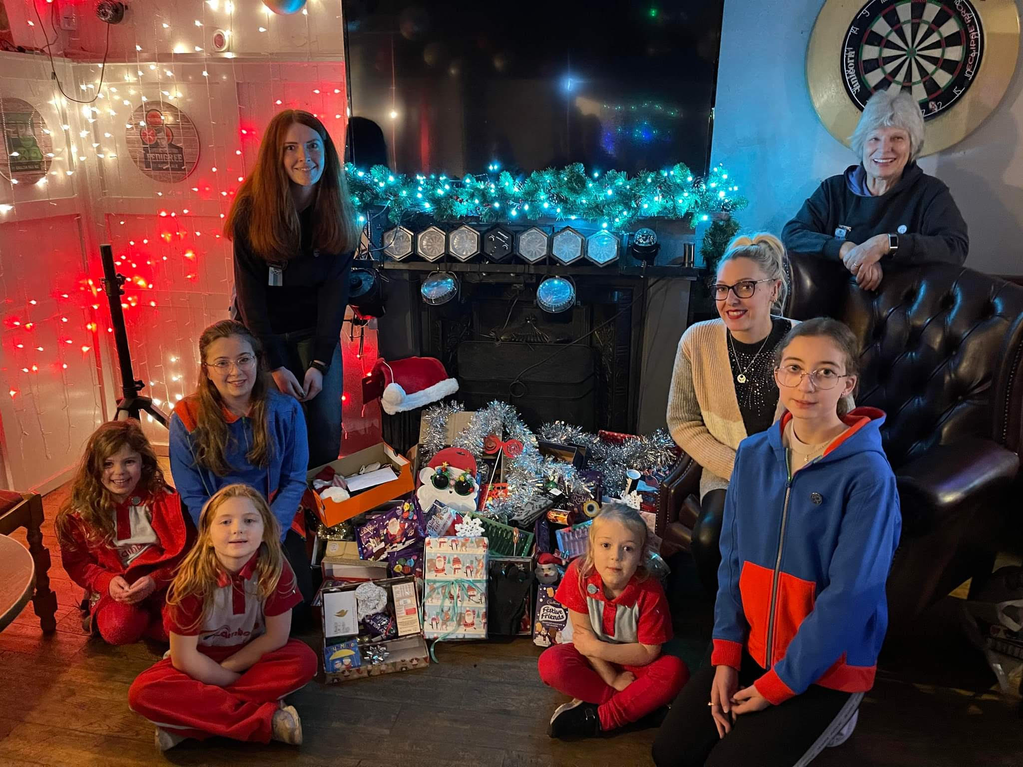 Girls collect Christmas gifts for foundation