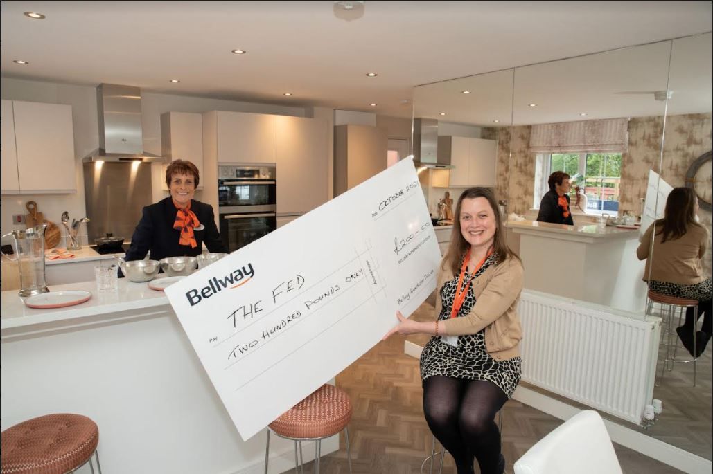 Prestwich charity receives donation for new cafe