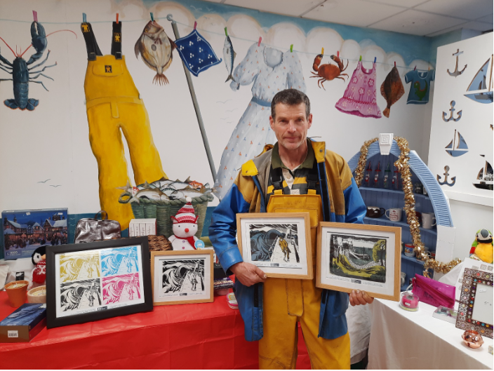 Fisherman donates art from father he never knew to raise funds for charity