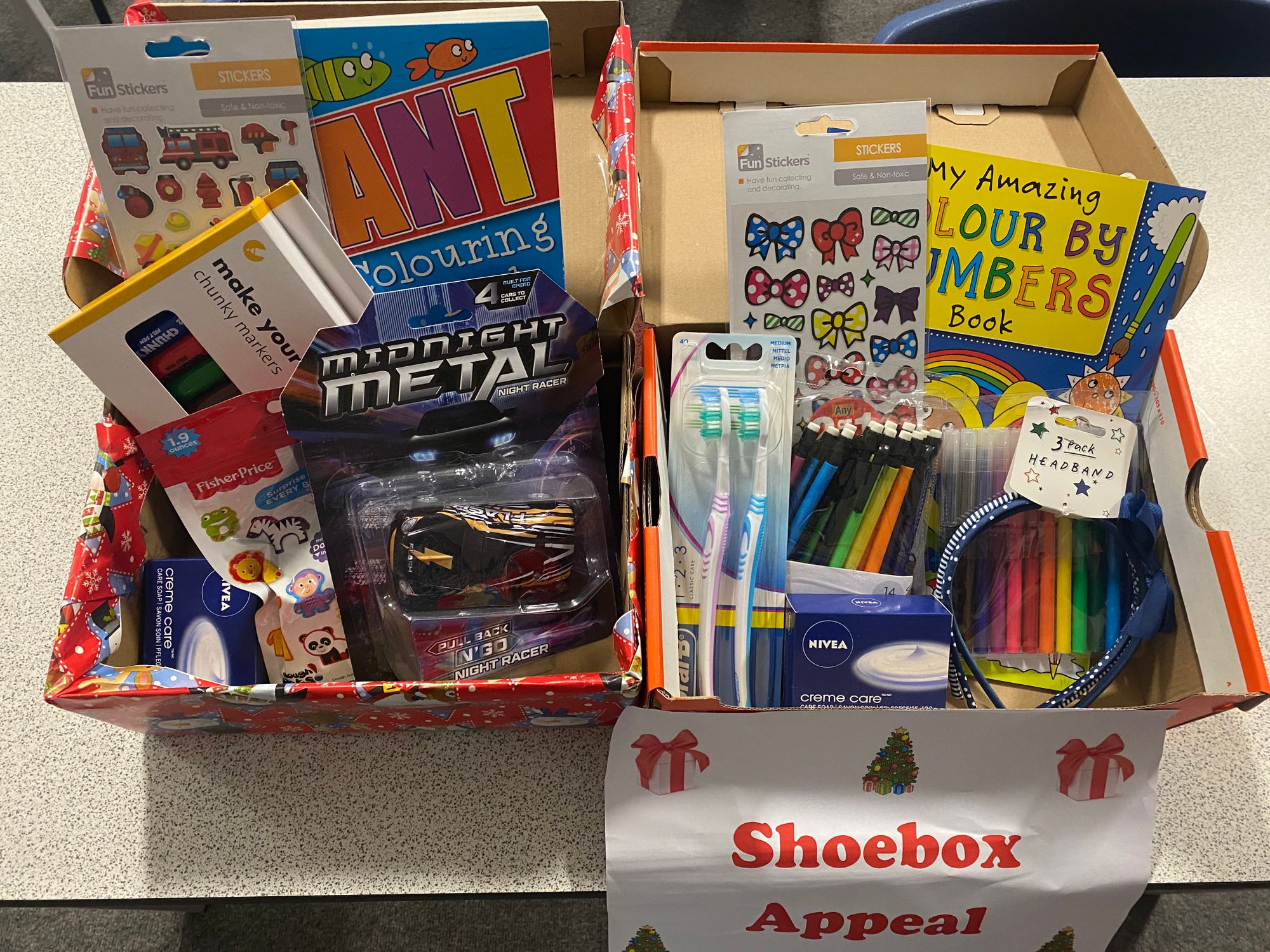 Ormiston Venture Academy helps prepare packages for annual Christmas shoebox appeal