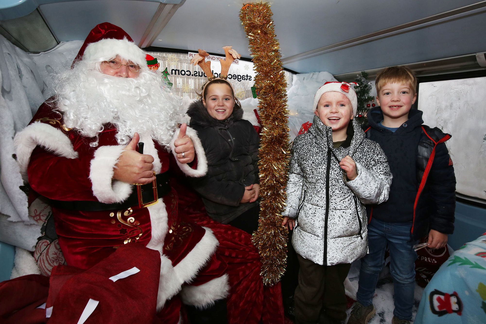 Santa leaves his sleigh at home and arrives in Ayrshire by bus!