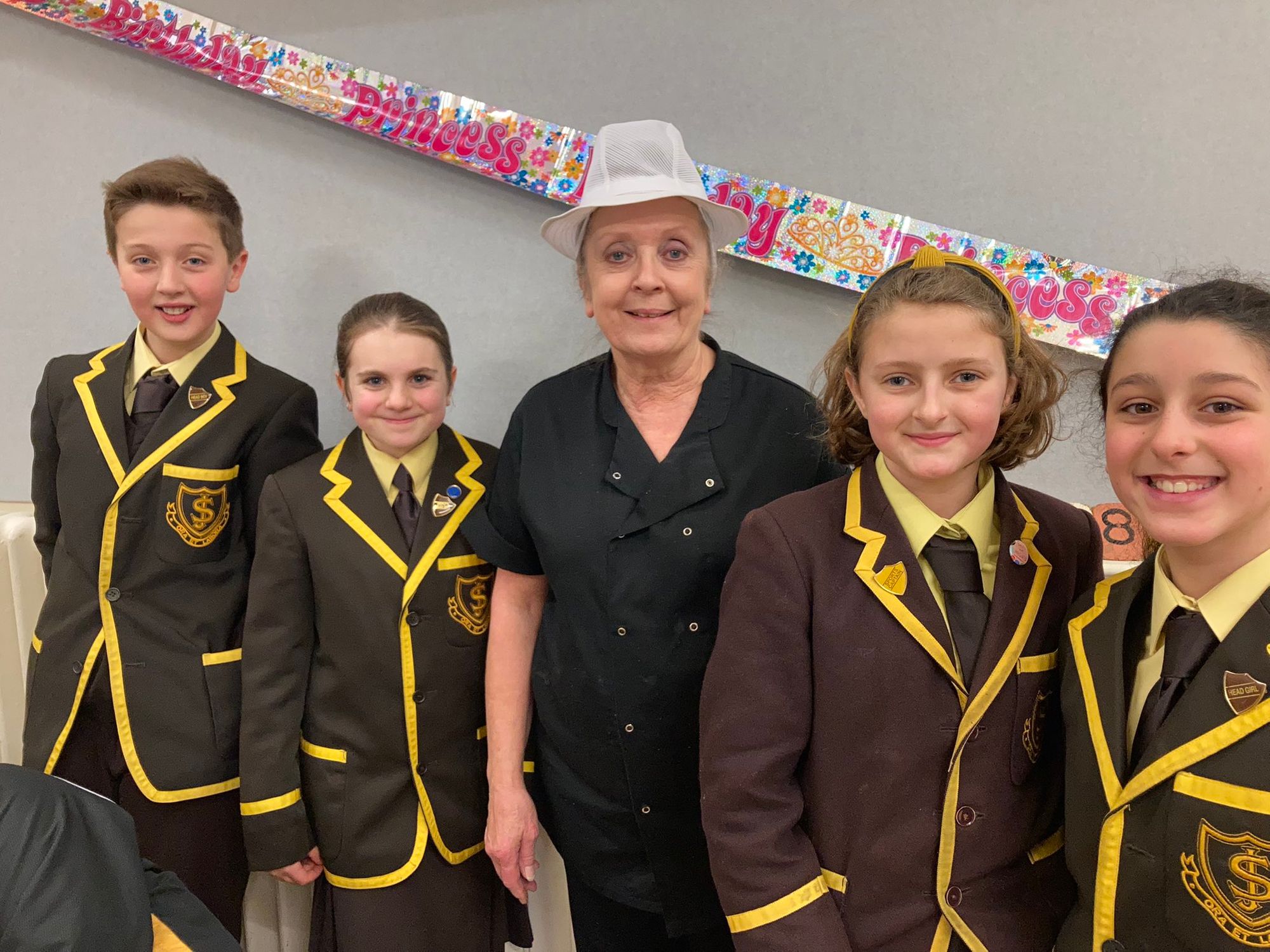 Hertingfordbury school celebrate 'excellent service' of catering team member as she retires