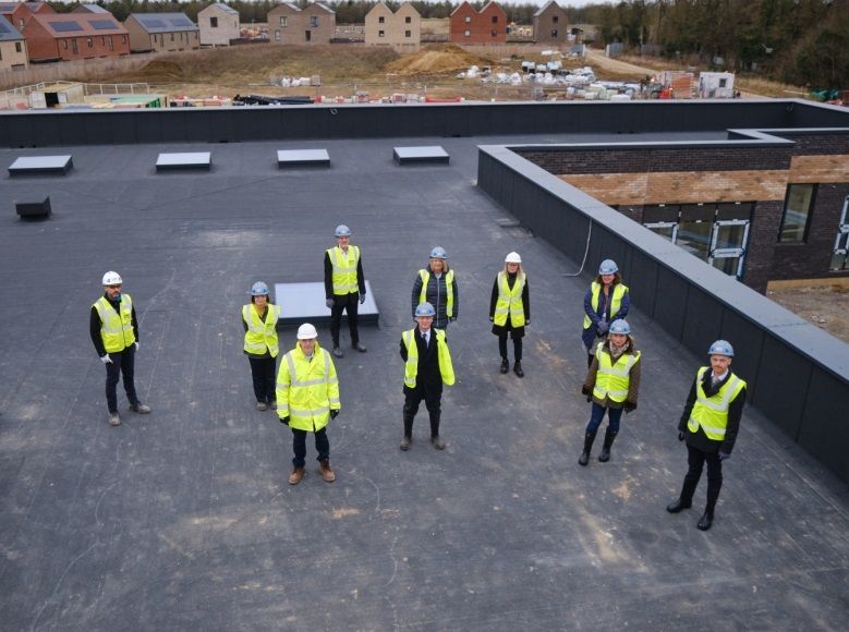 Ceremony celebrates milestone for new school being built in Marleigh
