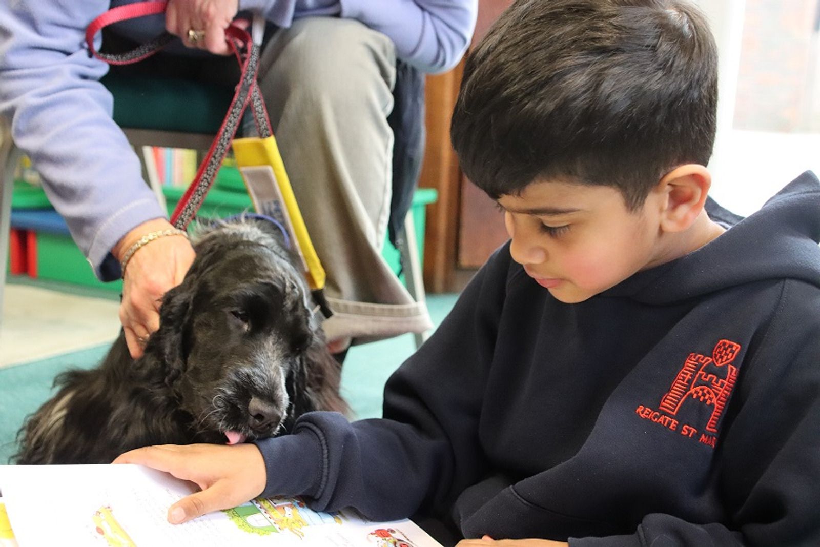 Reigate pupils welcome therapy dog for Children's Mental Health Week