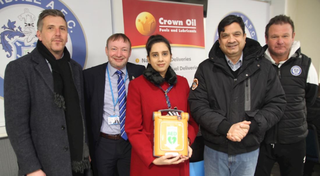 Councillor donates defibrillator to Rochdale AFC academy
