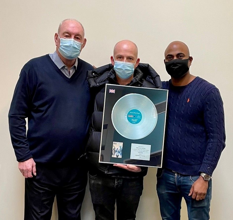 Noel Gallagher auctions platinum disc for charity