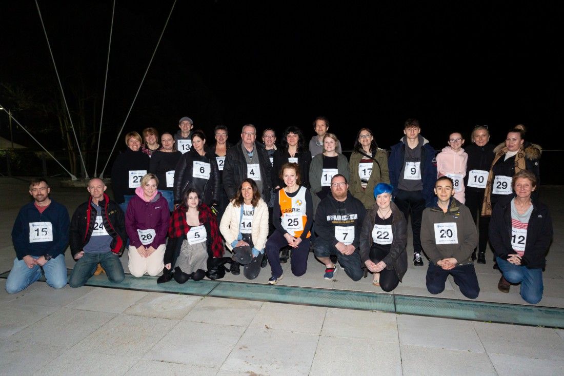 Dover and Deal fundraisers walk across burning coals