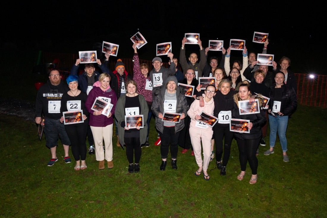 Folkestone fundraisers' fiery walk across burning coals