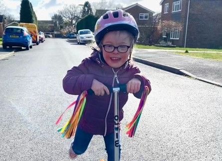 Five-year-old girl raises £1,000 for Down syndrome charity with scooter challenge
