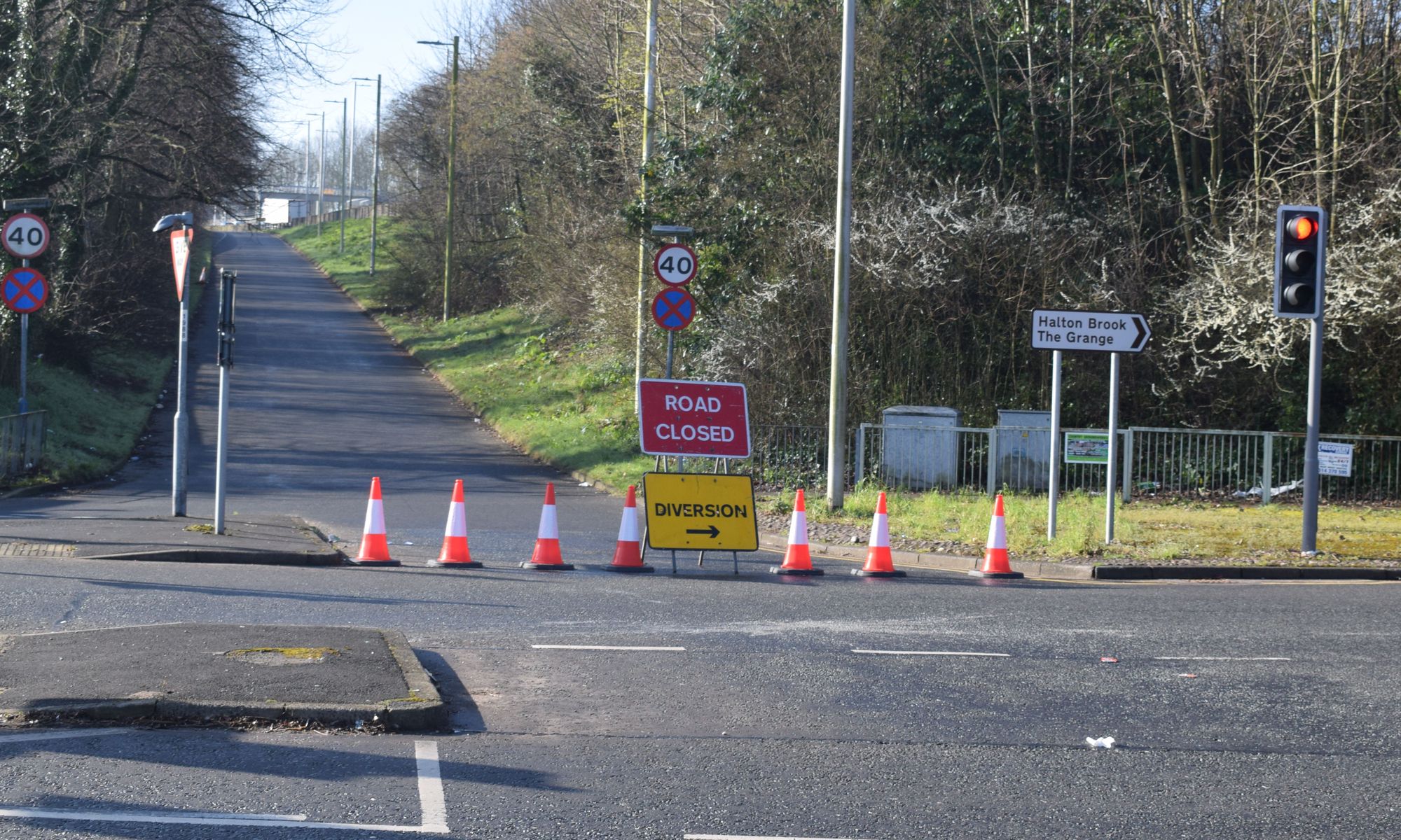 Runcorn road shut after car fire