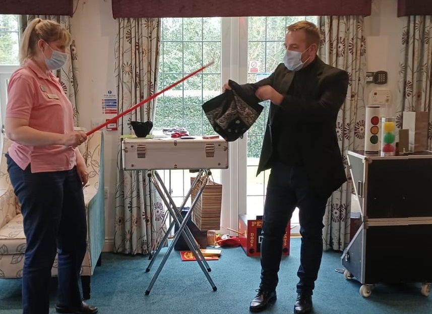 Magician's tricks entertain care home residents in Church Lawton