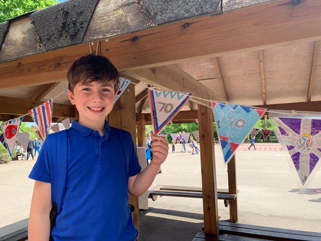 Yarn bombers and school children bring colour to Holmes Chapel for Queen’s Platinum Jubilee