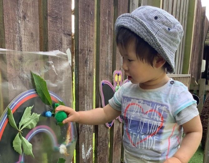 Cambridge children collect leaves to enhance fine motor skills development