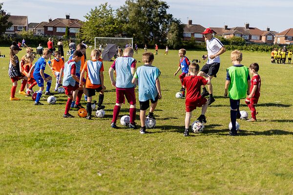 Halewood kids gifted football donation