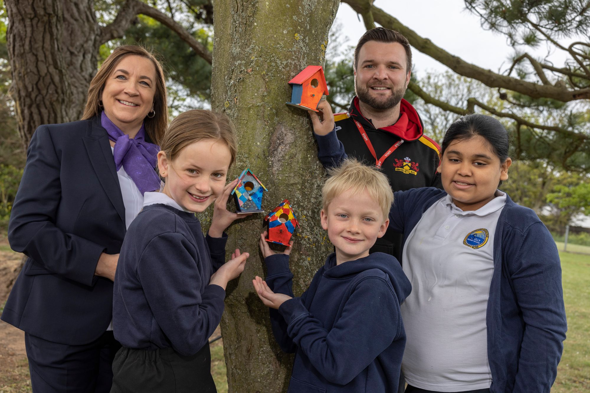 Bird boxes designed by South Wales primary school pupils on display at showhomes