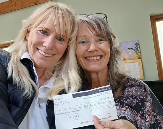 Carmarthen Town AFC makes donation to charity partner Mind