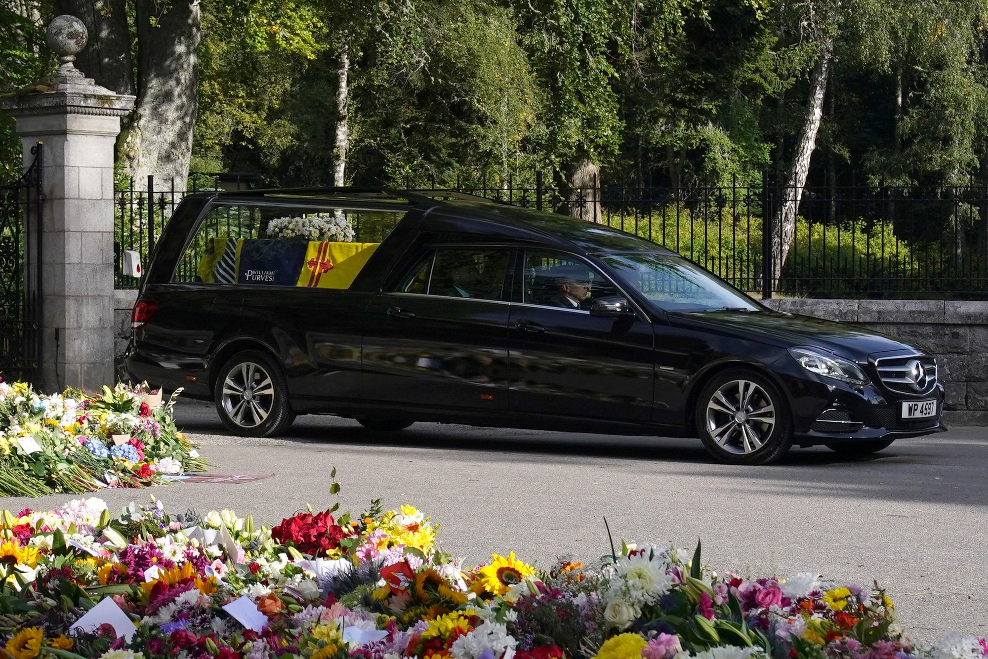 Thousands line streets as Queen's coffin is taken from Balmoral to Edinburgh