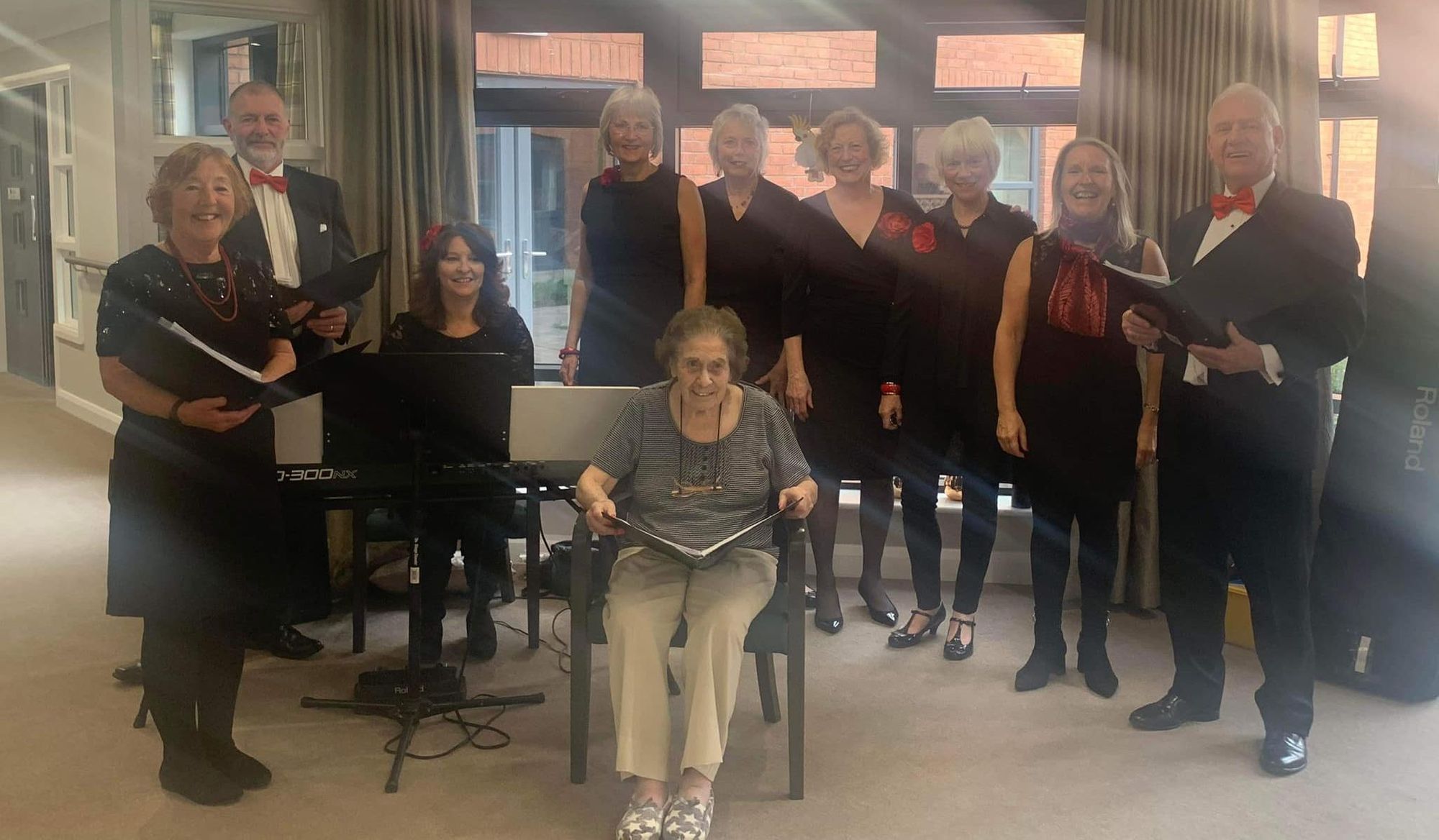 Redditch care resident 'overjoyed' as friends give surprise choir performance