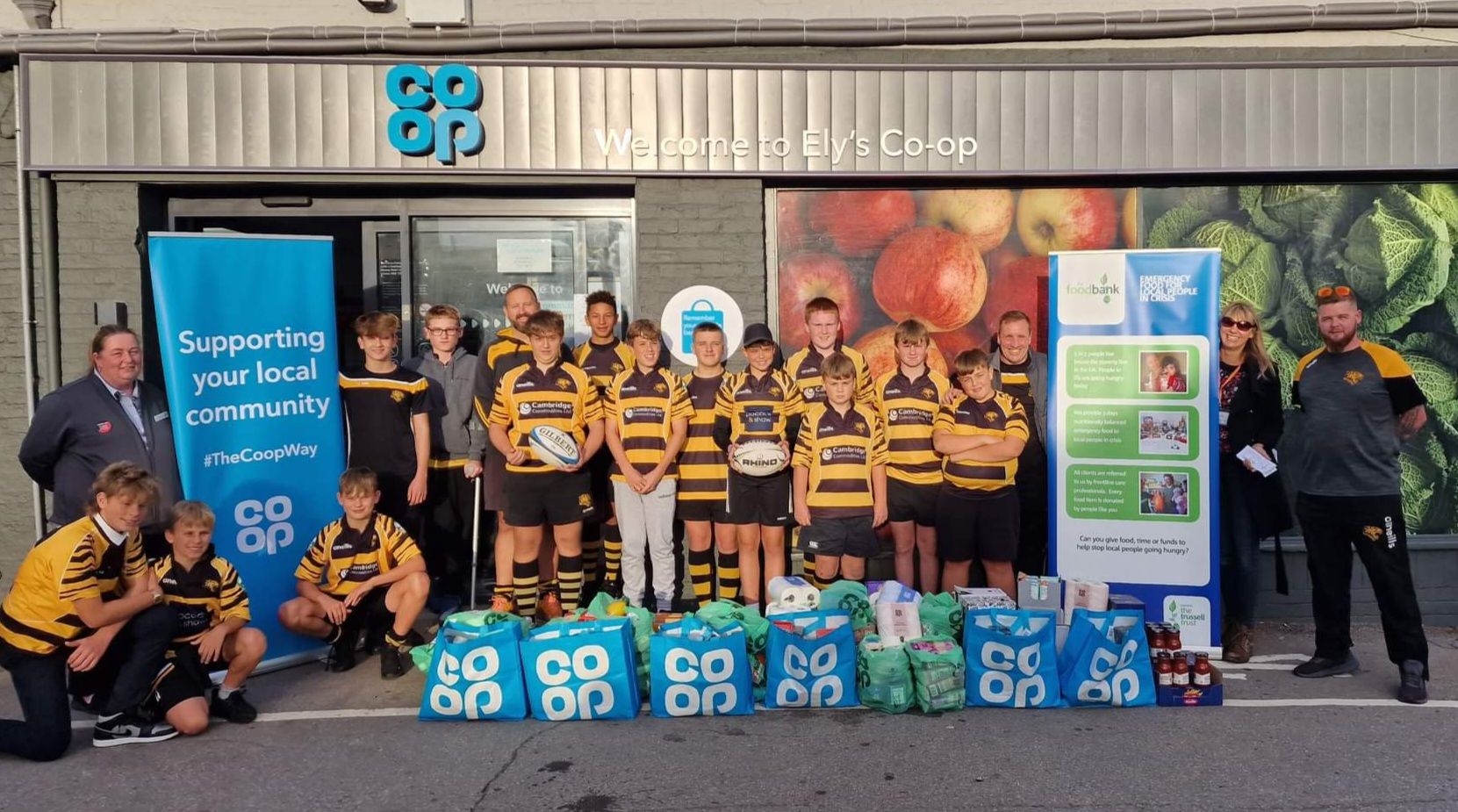Touring Tigers make much-needed donation to Ely Foodbank