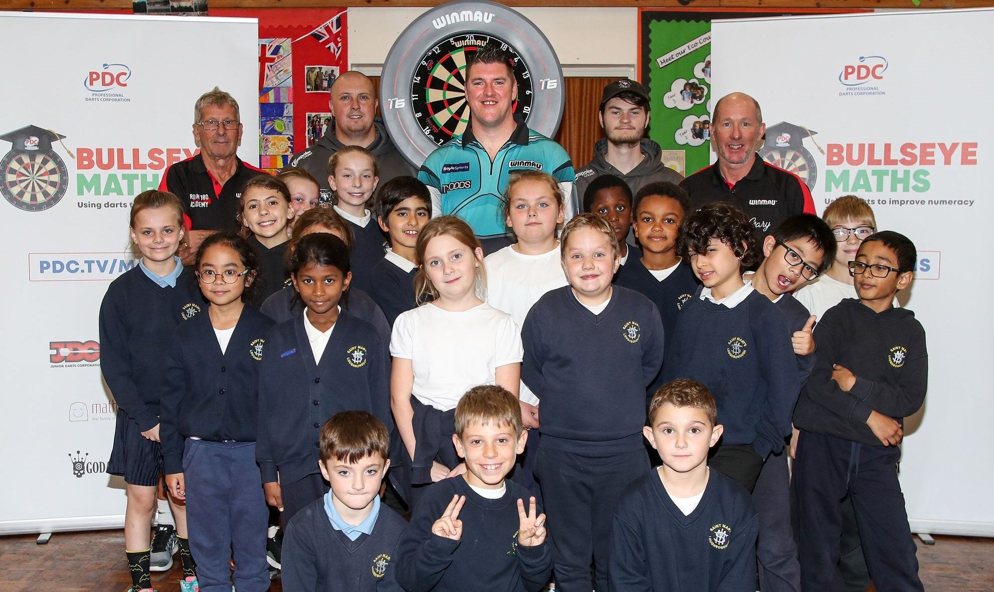 Loughborough pupils hit the bullseye in darts star's maths lesson