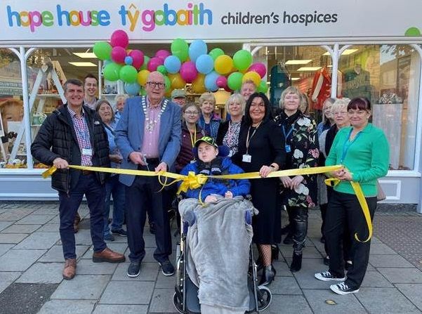 Mayor cuts ribbon at grand opening of Hope House in Mold