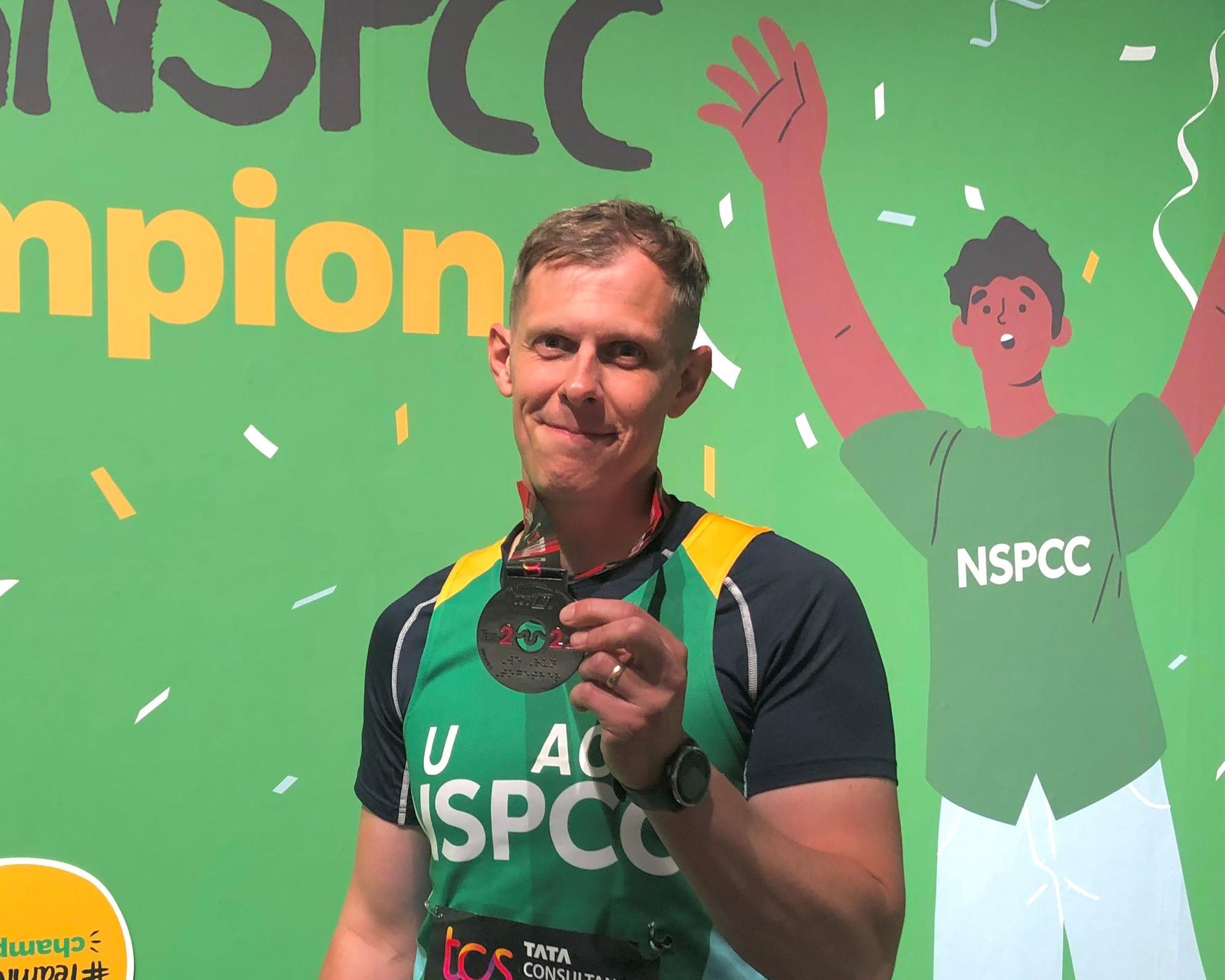 Cardiff dad achieves life goal in aid of NSPCC Wales