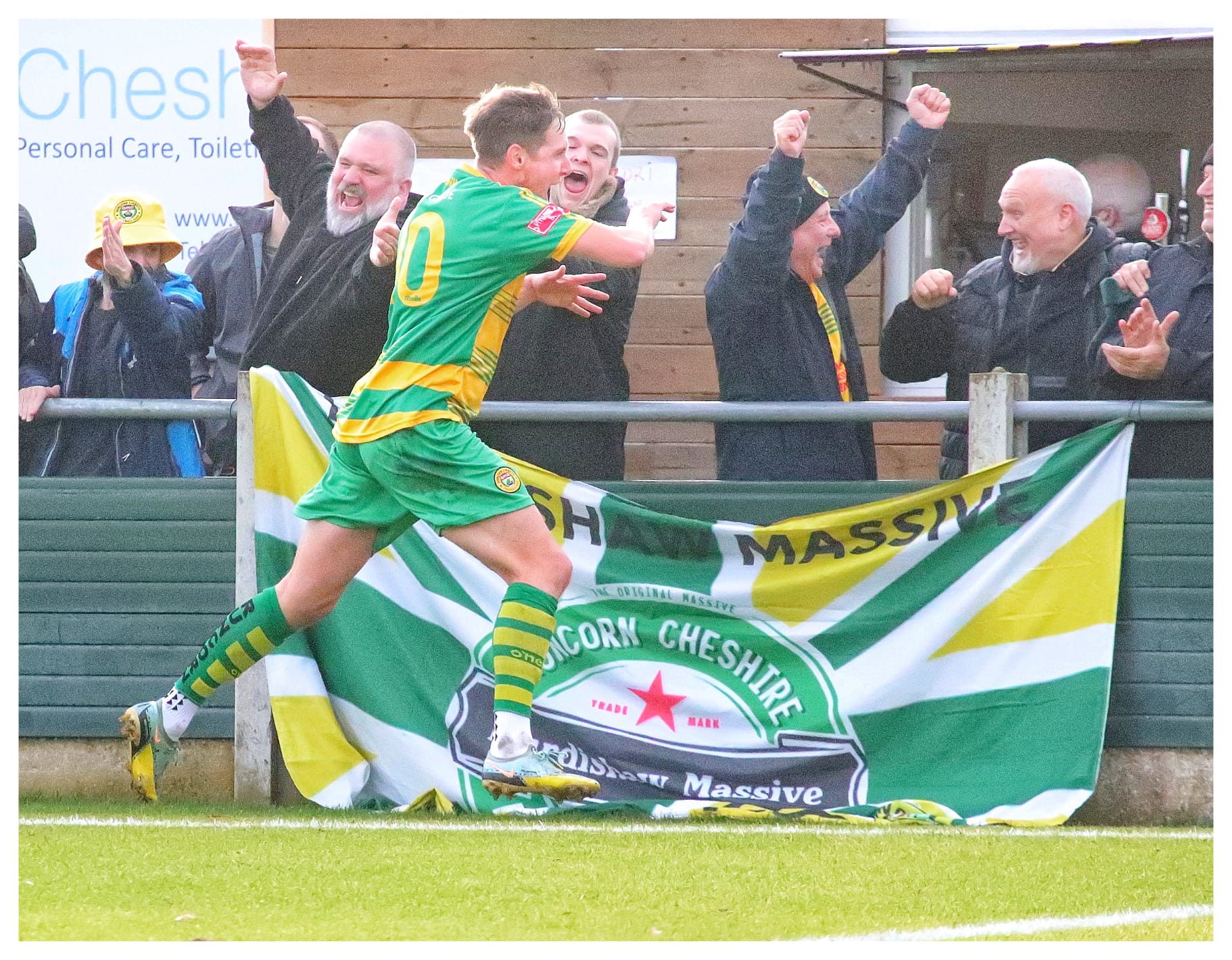 Football: Players, management and fans celebrate Linnets win over Belper