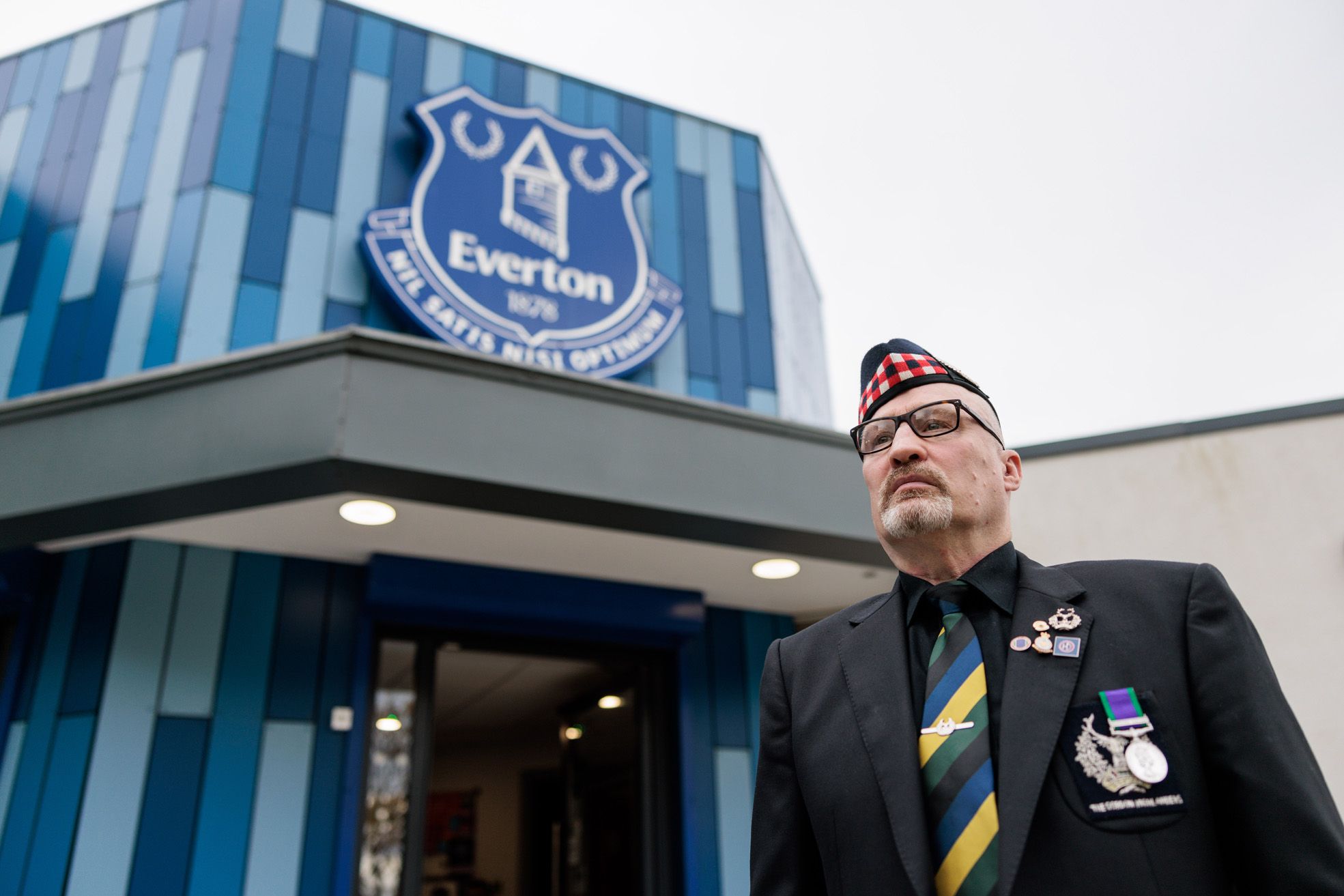 Veterans gather with comrades at Everton Football Club to remember