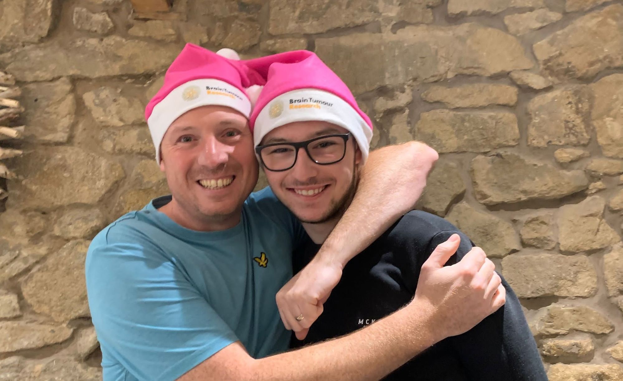 Bury dad and son support festive fundraiser for Brain Tumour Research