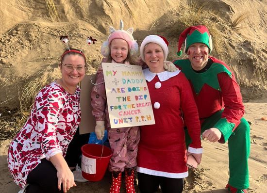 Llanelli couple raise more than £1,700 with Boxing Day Walrus Dip in aid of breast care unit