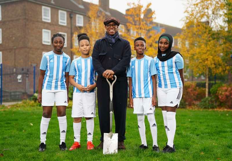 Arsenal legend Ian Wright kicks off football pitch construction at his old Lewisham school