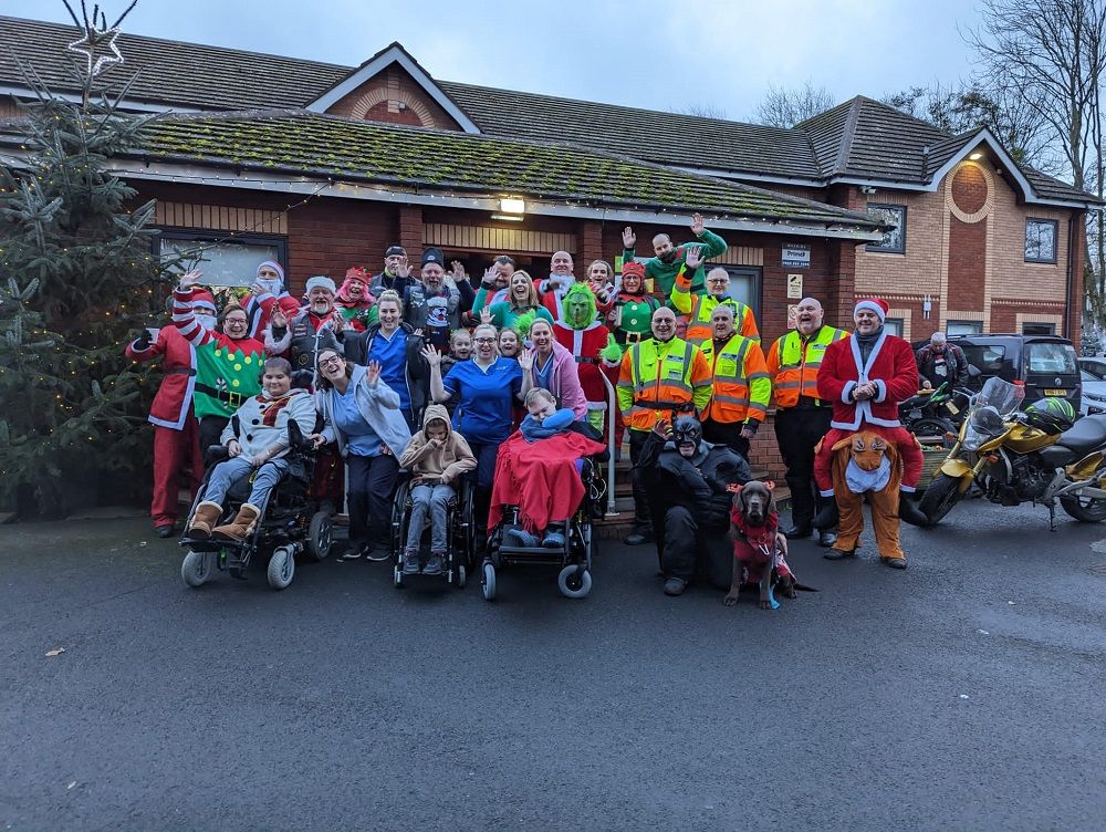 Father's emotional ride as bikers bring sacks of Christmas joy to hospice children