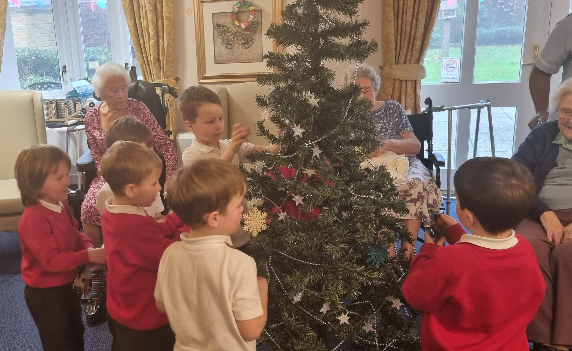 Children bring festive cheer to Chipping Campden care home