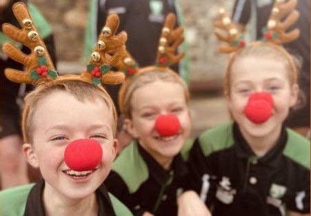 Children run in antlers and red noses to raise thousands for Rowcroft Hospice