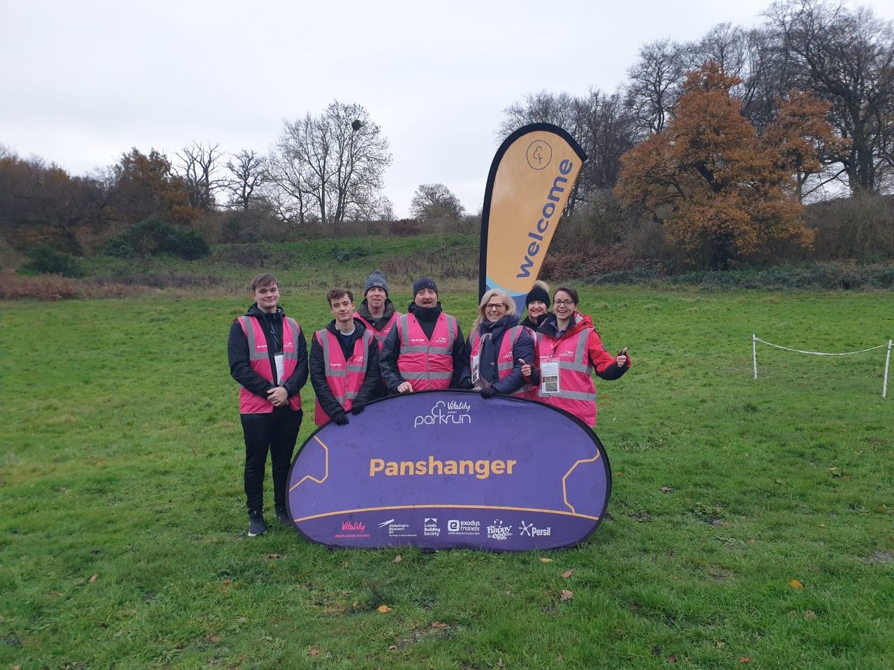 Hertford volunteers bring the cake and good spirits in support of Panshanger parkrun