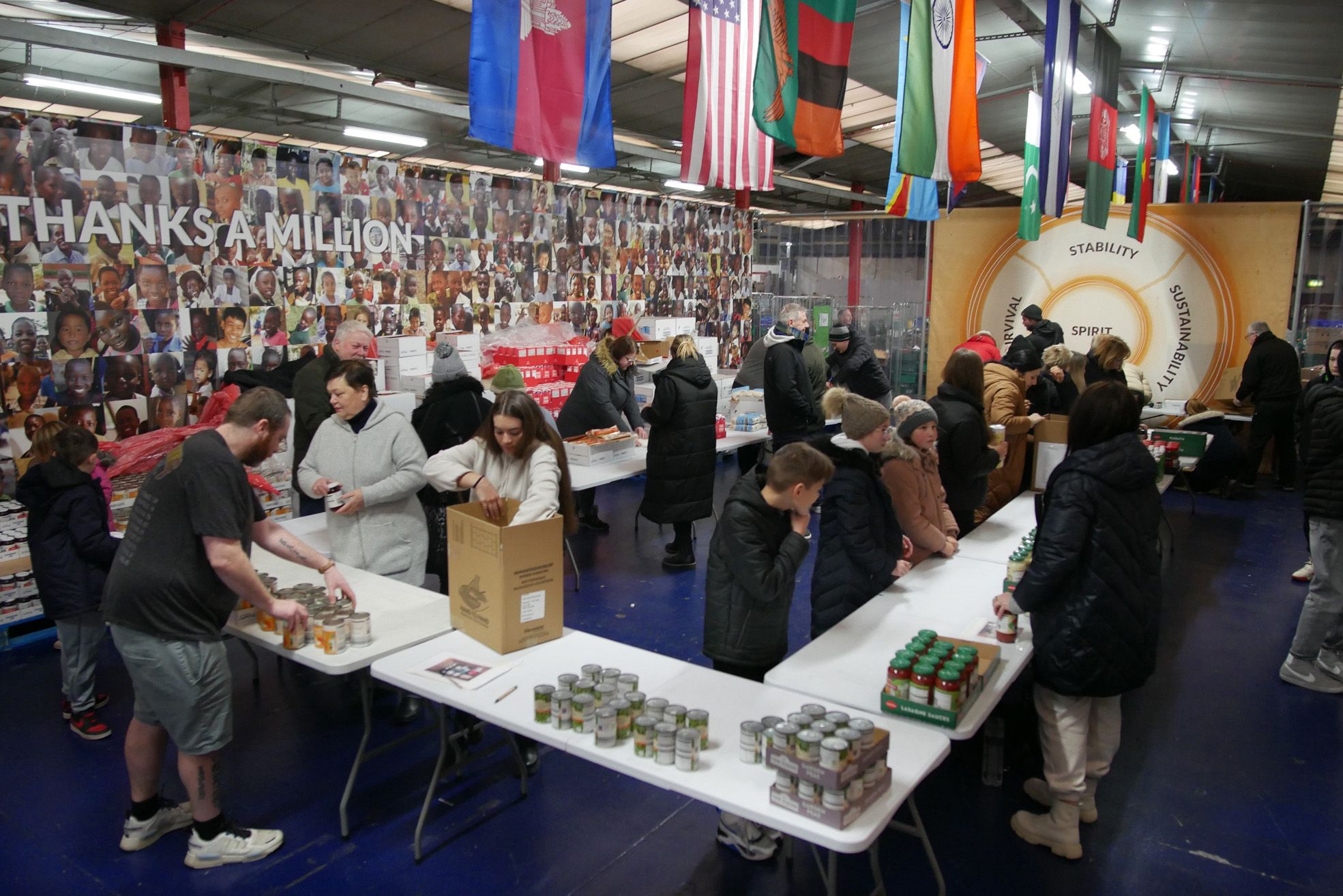 Ukrainian refugees help with emergency food pack in Sutton Coldfield