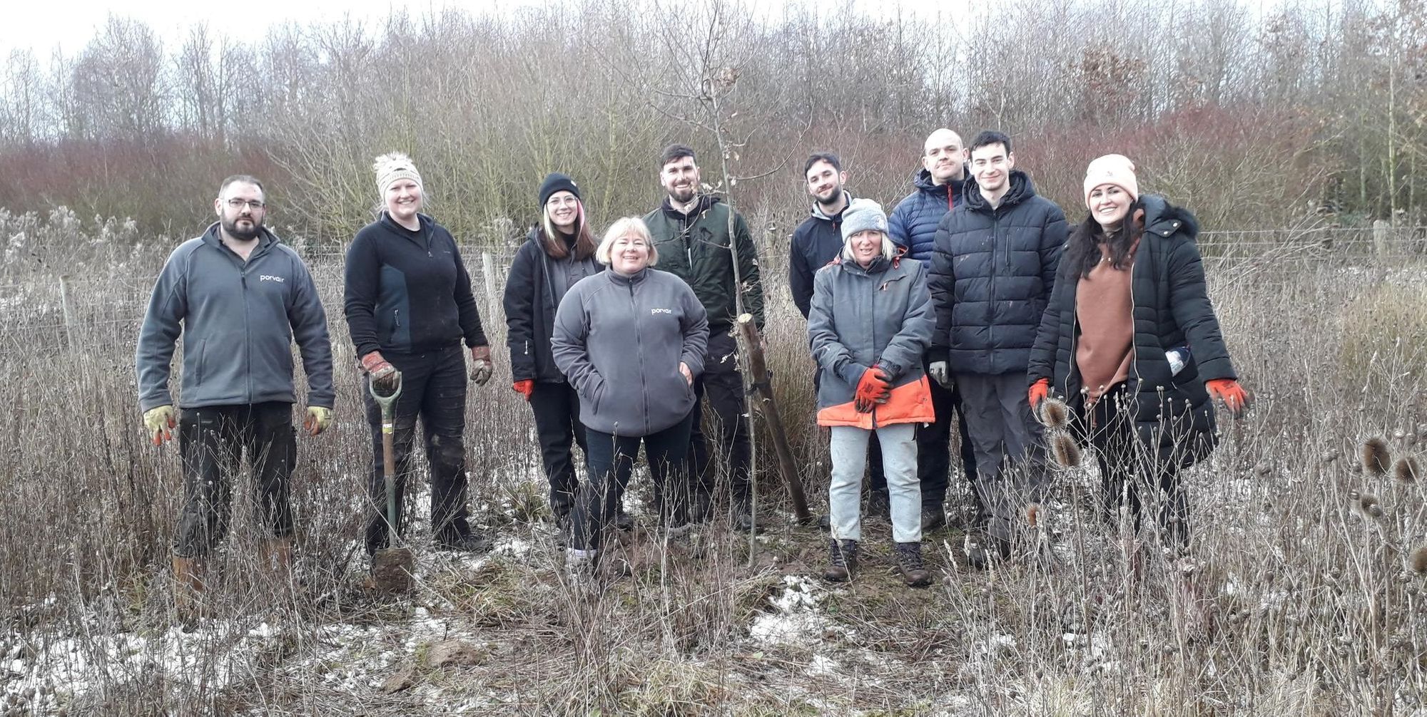 Wrexham tech firm joins local conservation group for tree planting day