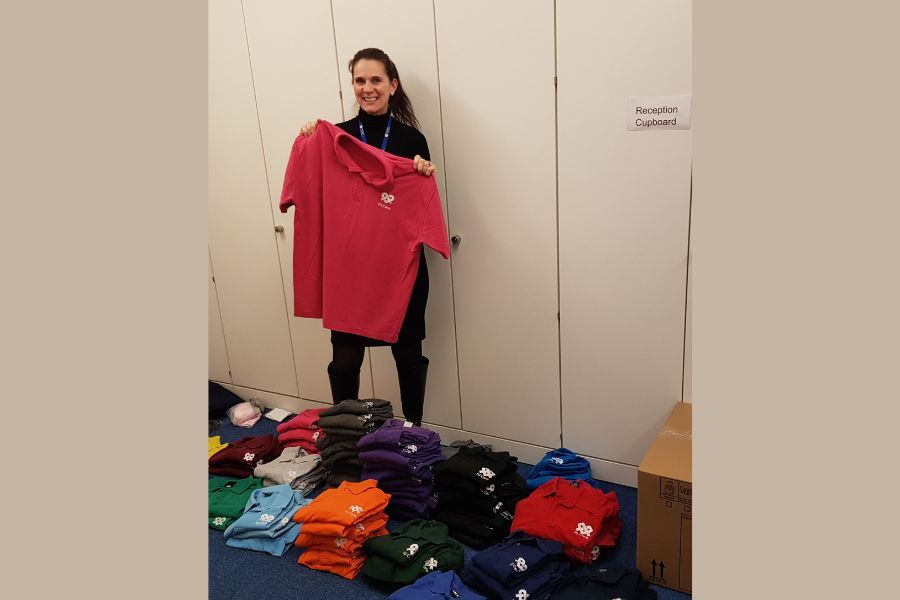 Milton Keynes care provider donates 400 polo shirts to school in Africa