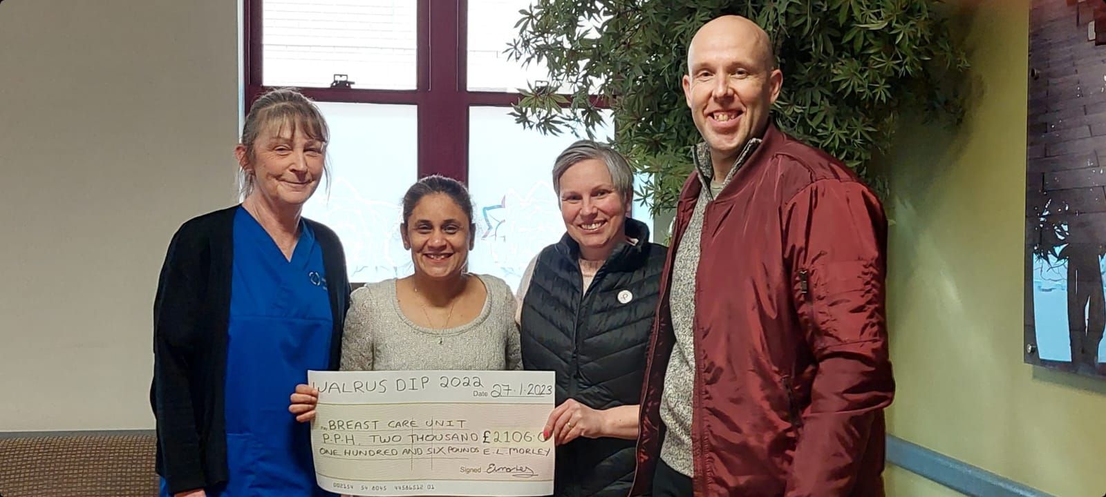Llanelli couple present cheque of more than £2,000 to breast care unit as huge thank