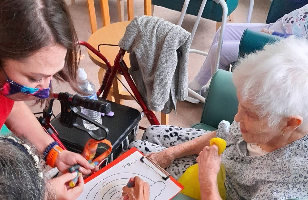 Dartford care residents practice Spanish skills with local toddlers