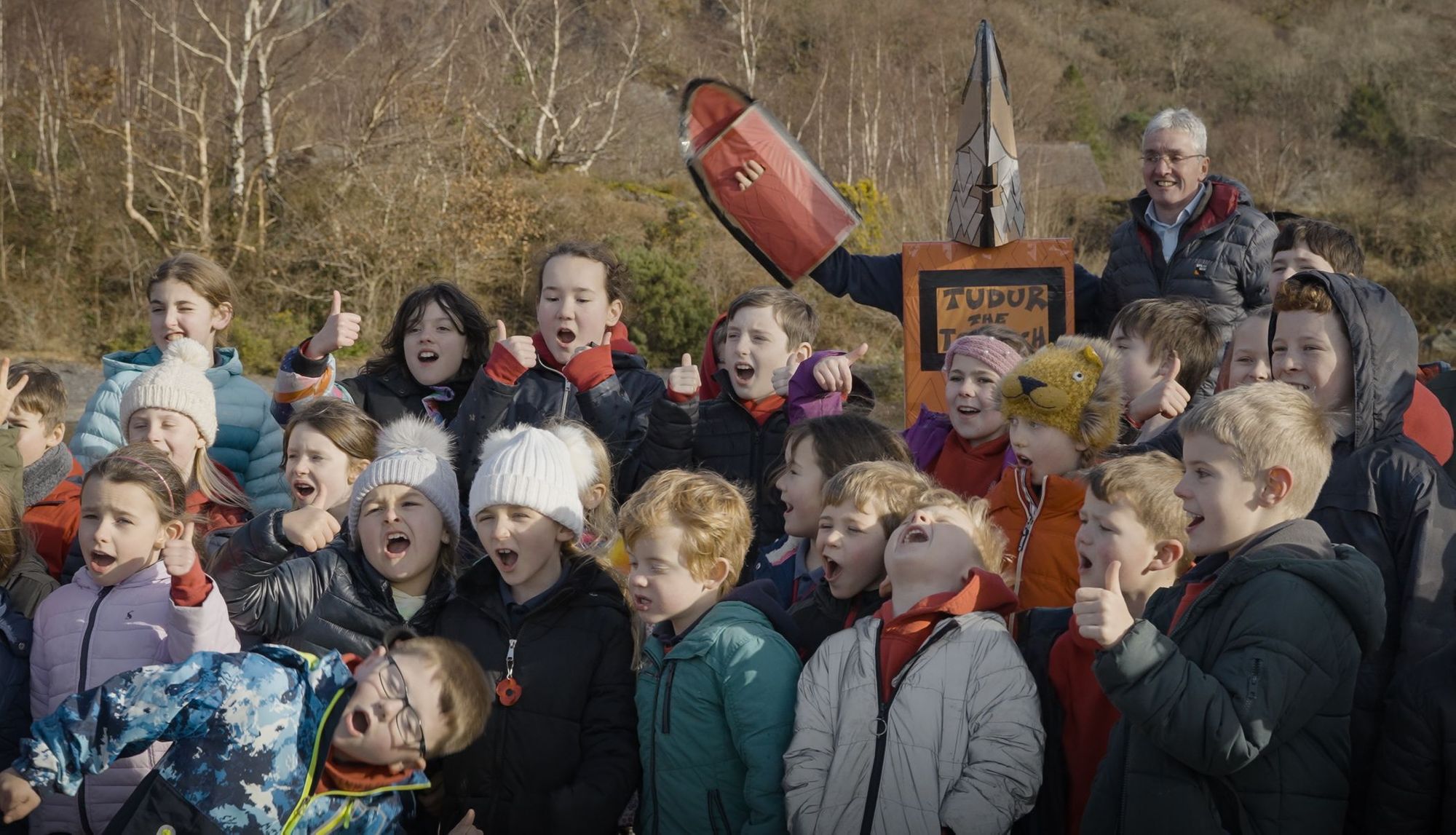 Caernarfon school pupils release 100 rare ice age fish into Llyn Padarn