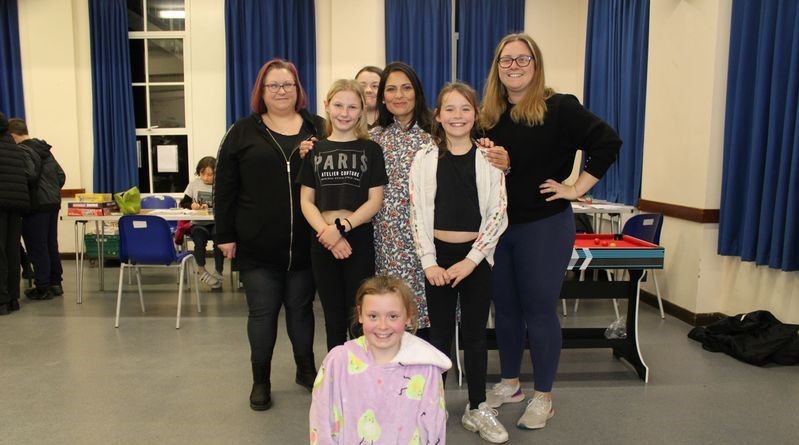 Witham MP returns to local youth club with a personal donation of games and supplies