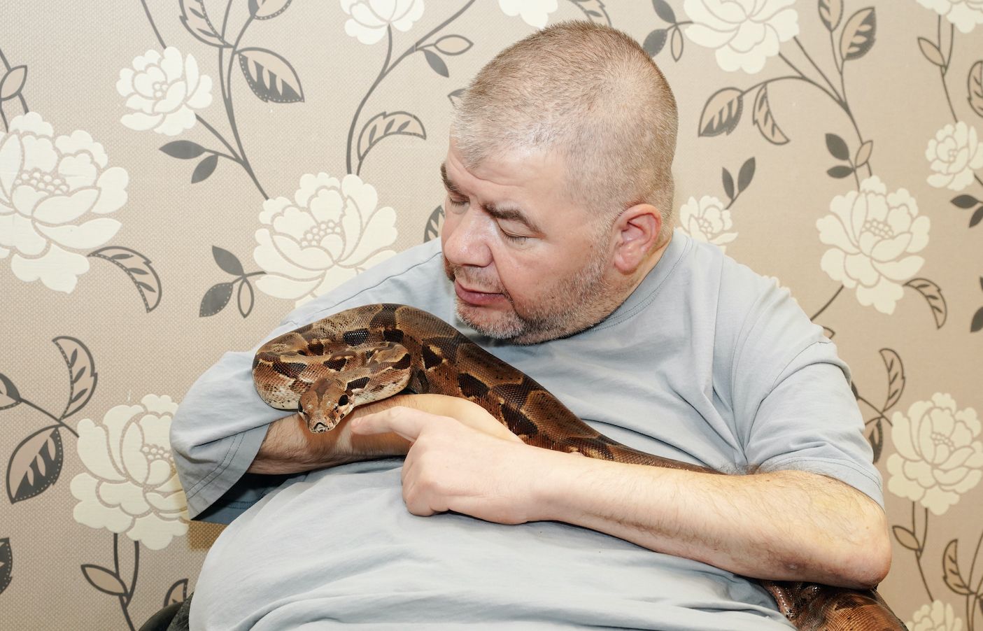 Colchester care residents get up close and personal with some friendly snakes