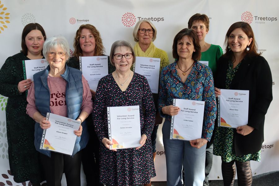 Staff and volunteers celebrate an incredible 415 years of service