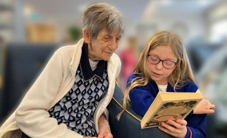 Care home residents and Margate pupils celebrate World Book Day together