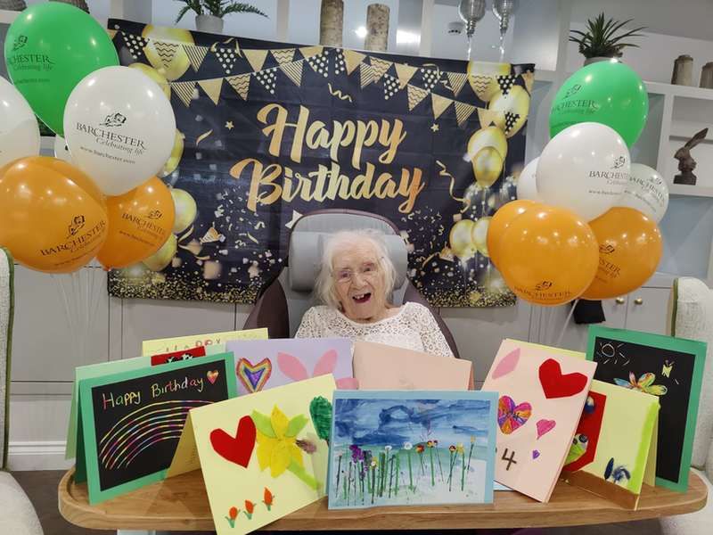 Champagne corks pop as 104-year-old Marion celebrates birthday in style