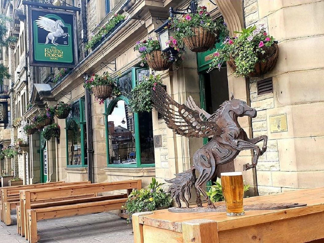 Flying Horse Hotel named named CAMRA pub of the year for Rochdale