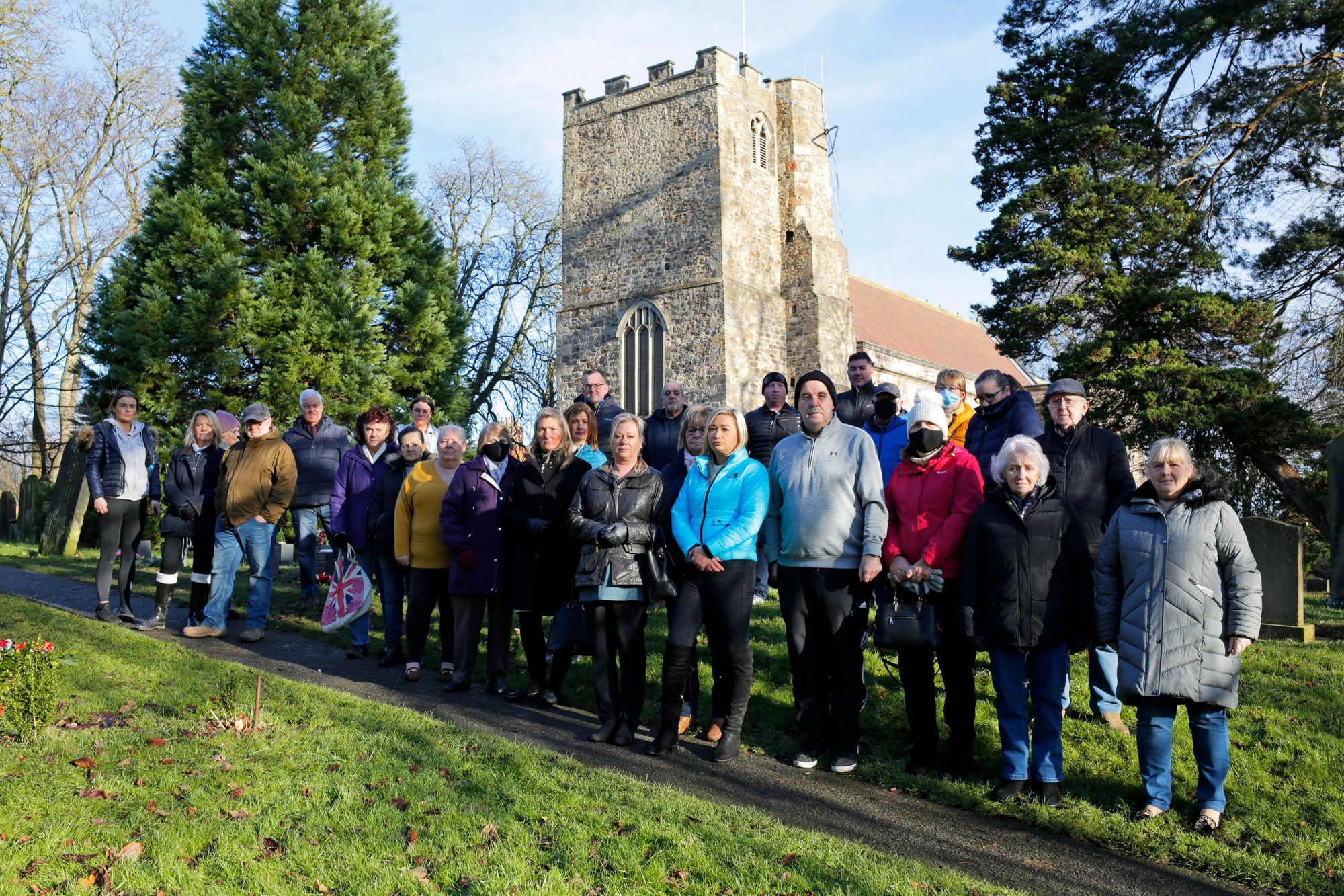 Families fight churchyard's ban on fake flowers as graveside tributes binned