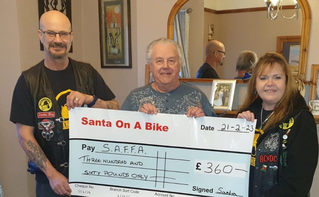Welsh biker duo present fundraising cheque to SSAFA
